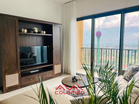 Furnished Modern Living Room with windows and balcony view from Tri-Zen Tower 3 Type C5 Apartment for Rent or Lease in Colombo 2 by Colombo Realtors