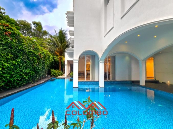 Battaramulla Parliament Road The Best Modern Super Luxury House with garden and Swimming Pool for sale or to buy offered by Colombo Realtors Real Estate Company in Sri Lanka.