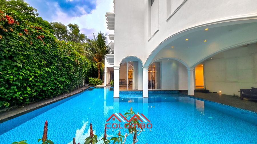 Battaramulla Parliament Road The Best Modern Super Luxury House with garden and Swimming Pool for sale or to buy offered by Colombo Realtors Real Estate Company in Sri Lanka.