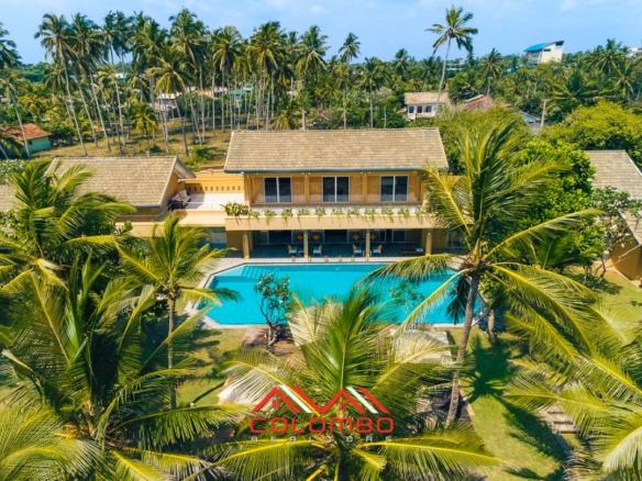 Luxury Beachfront Villa / Hotel with beach frontage land and sea ocean view for sale in Wadduwa offered by Colombo Realtors Real Estate Company in Sri Lanka